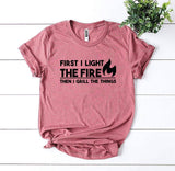 First I Light The Fire T-shirt - A Woman Knows Best