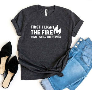 First I Light The Fire T-shirt - A Woman Knows Best