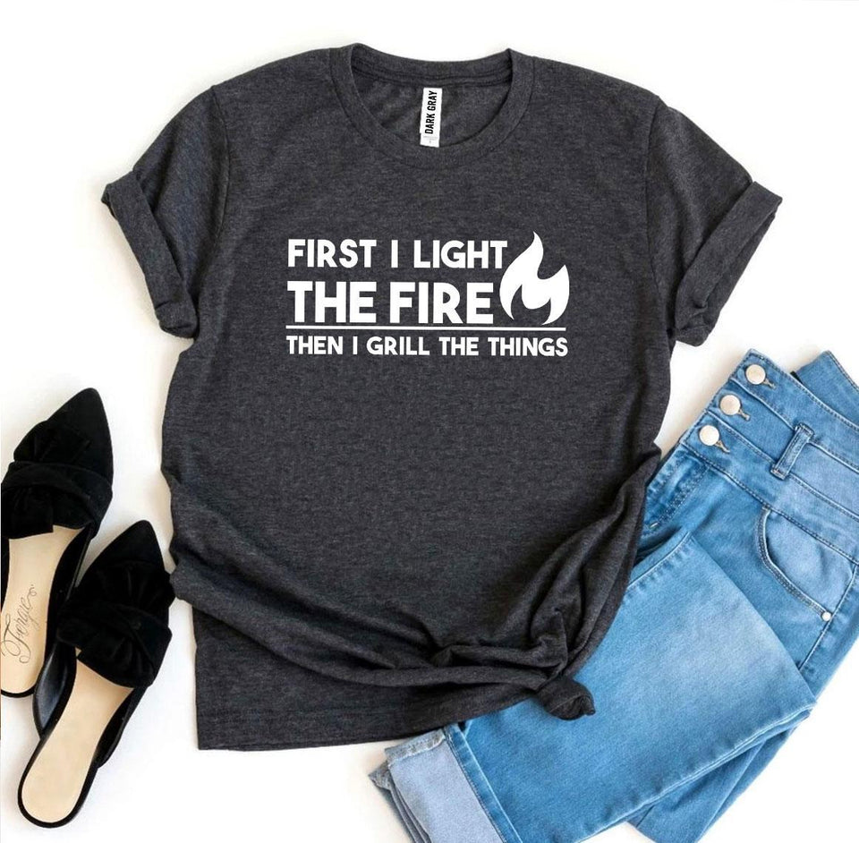 First I Light The Fire T-shirt - A Woman Knows Best