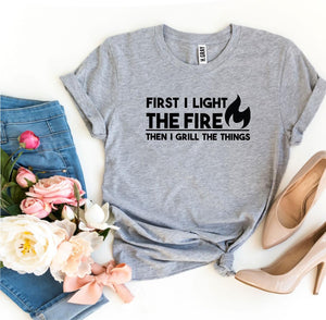 First I Light The Fire T-shirt - A Woman Knows Best