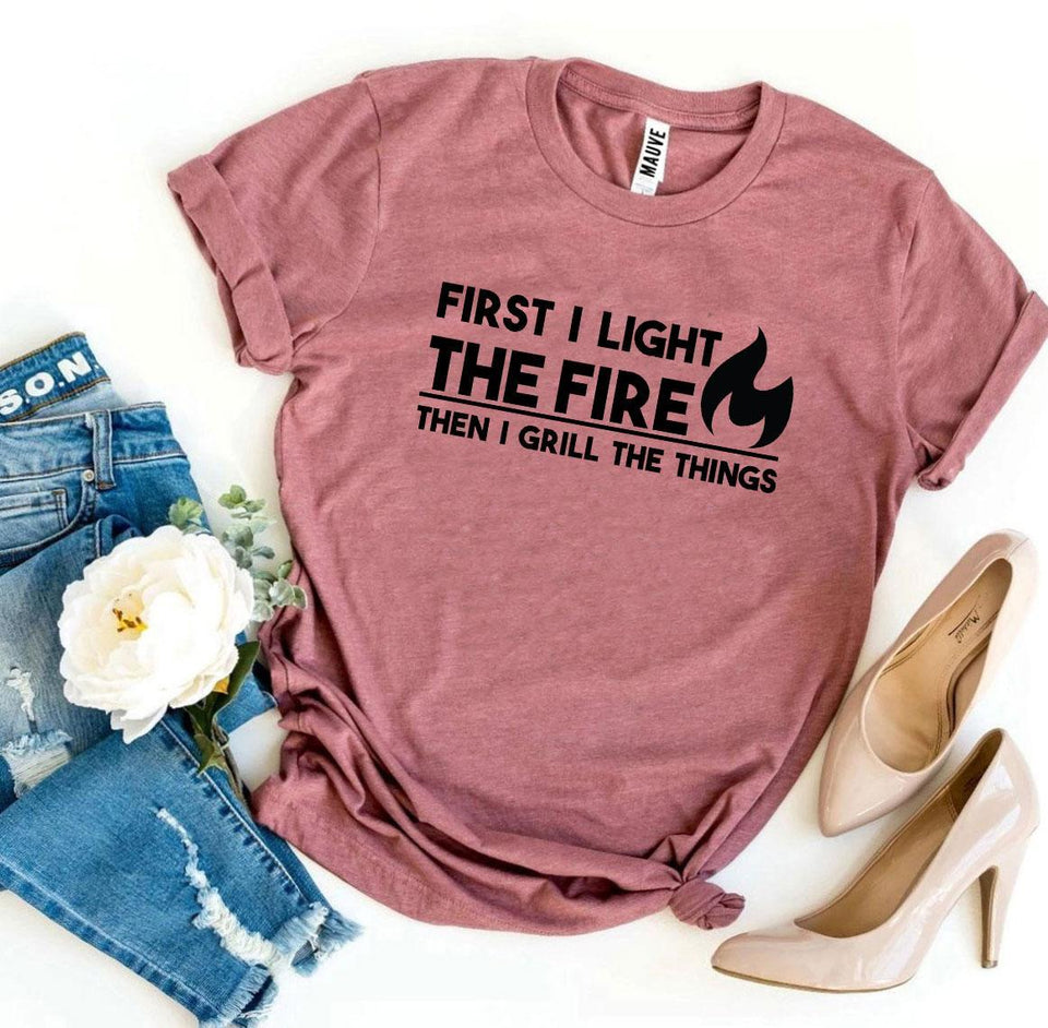 First I Light The Fire T-shirt - A Woman Knows Best